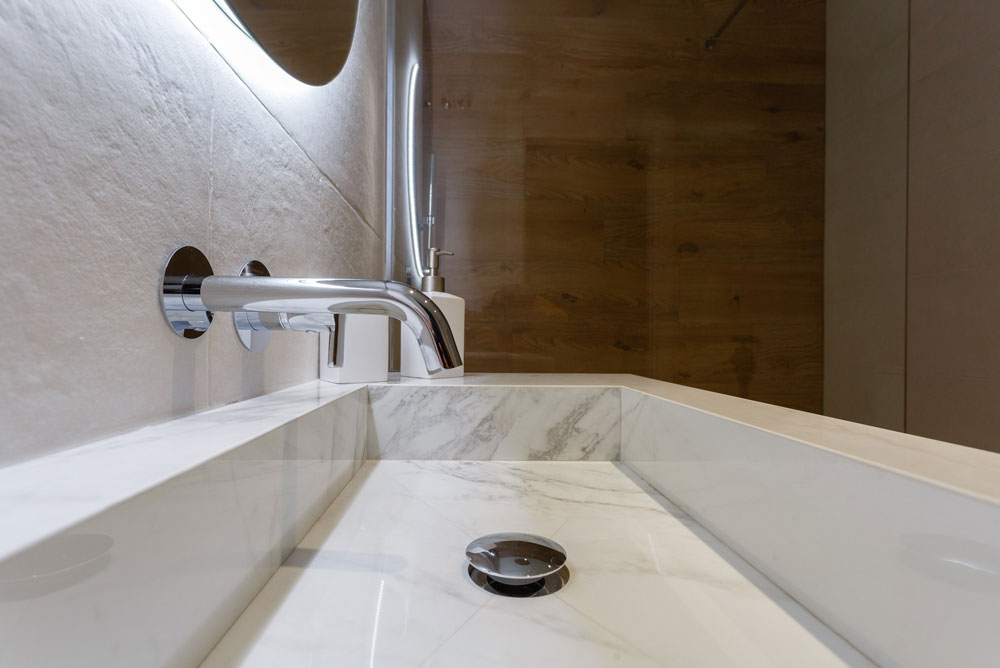 Proyecto de interiorismo Vivienda Larga lavabo mármol baño Proyecto de interiorismo Vivienda Larga lavabo mármol baño