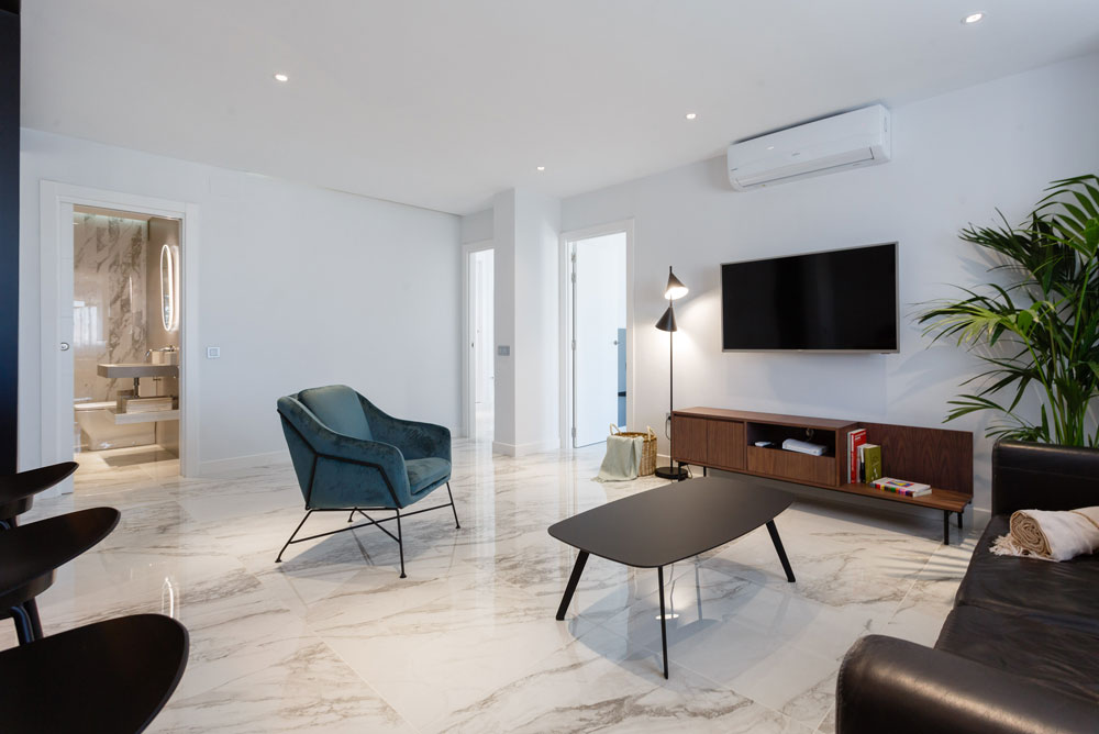 Proyecto de interiorismo Vivienda Larga vista completa salón Proyecto de interiorismo Vivienda Larga vista completa salón